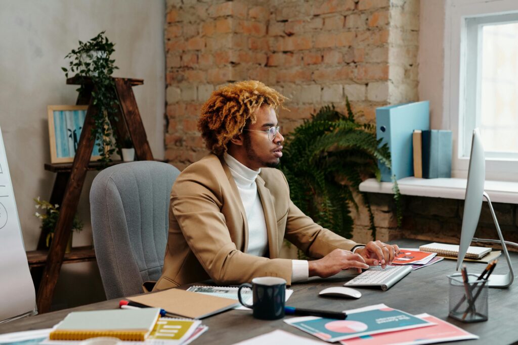 image showing a man working on computer