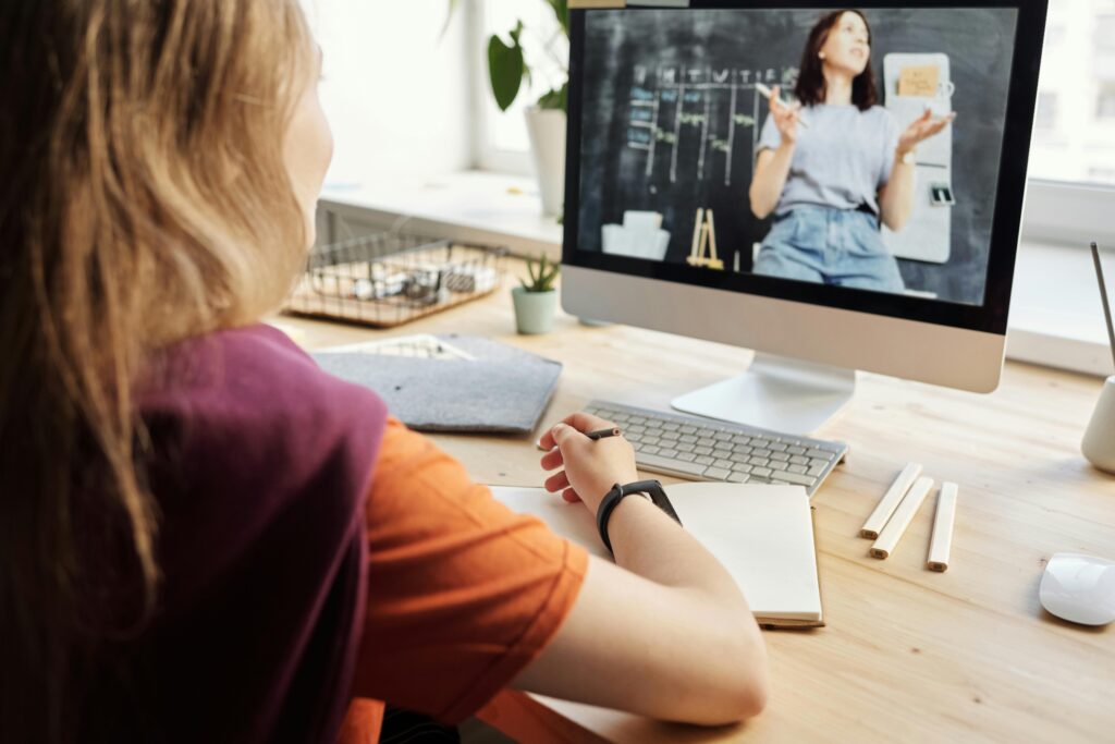 image showing a girl studying with AI tutor