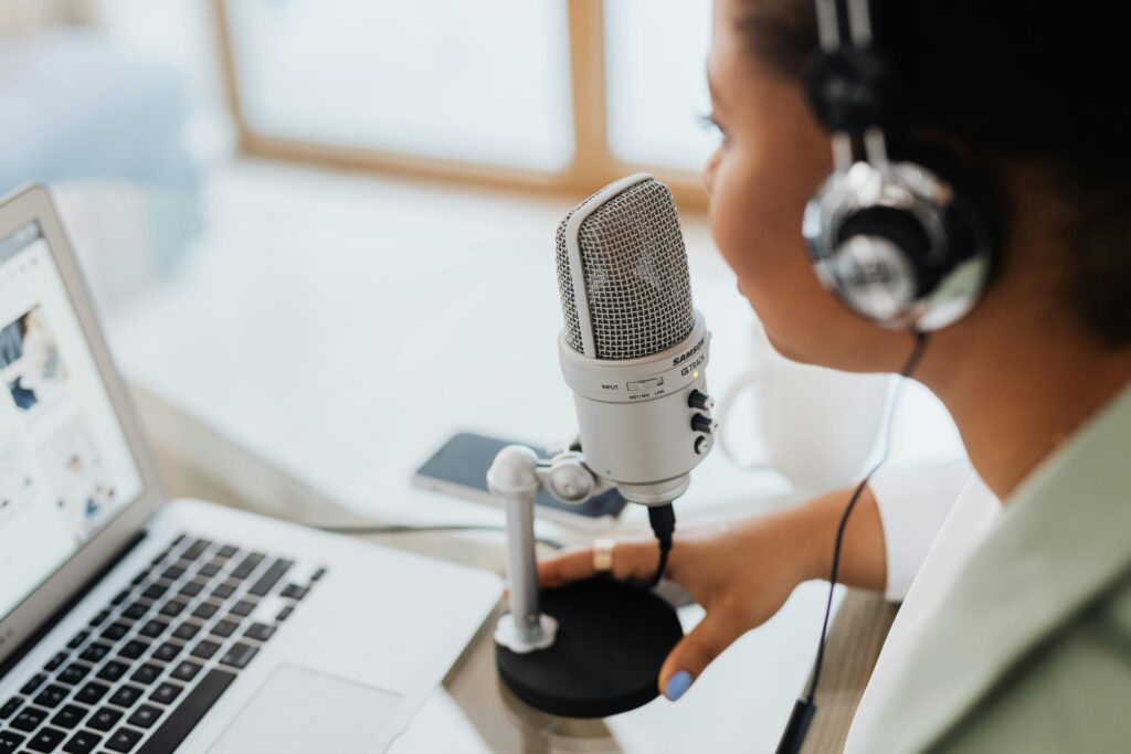 image showing voiceover artist using 10 AI money making tool in 2025