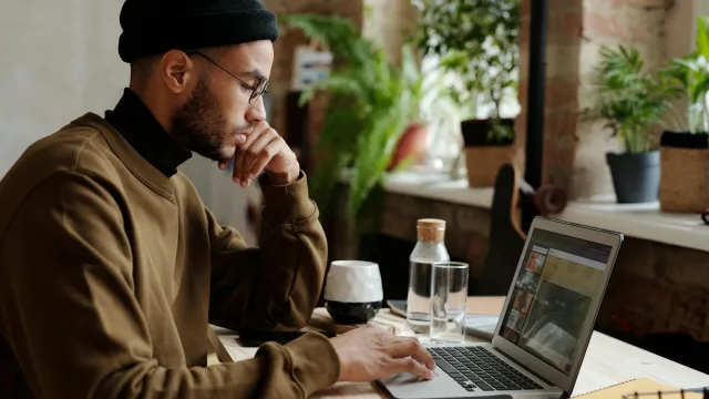 finding freelance skills image of person finding skills on laptop